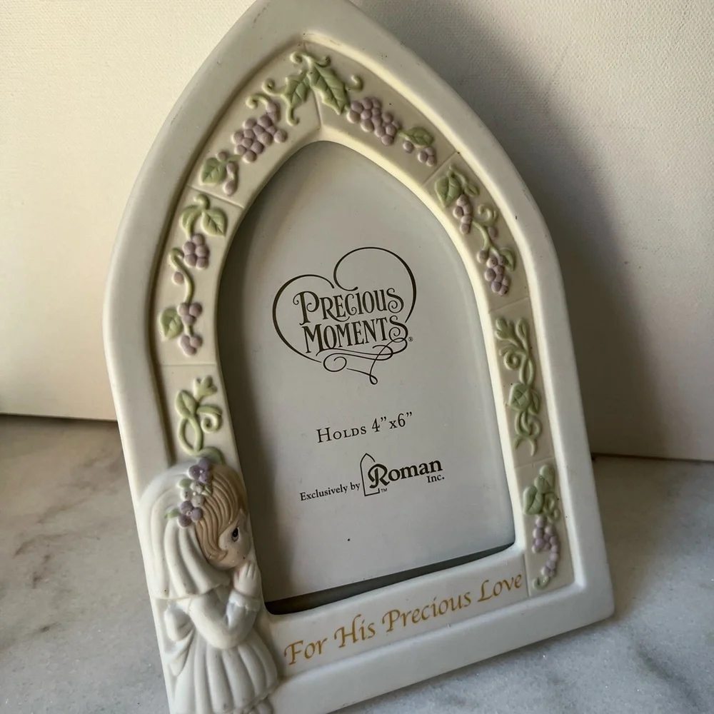 Ceramic precious moments pictures frame holds 4x6”